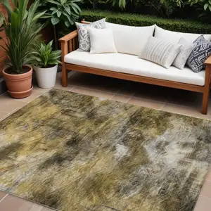 Photo of Brown Beige And Gold Abstract Washable Indoor Outdoor Area Rug