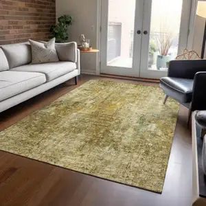 Photo of Brown Beige And Gold Abstract Washable Indoor Outdoor Area Rug