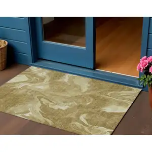 Photo of Brown Beige And Ivory Abstract Washable Indoor Outdoor Area Rug