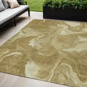 Photo of Brown Beige And Ivory Abstract Washable Indoor Outdoor Area Rug