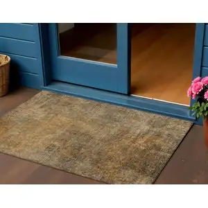 Photo of Brown Beige And Taupe Abstract Washable Indoor Outdoor Area Rug