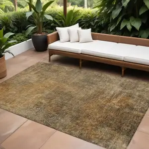 Photo of Brown Beige And Taupe Abstract Washable Indoor Outdoor Area Rug