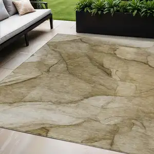 Photo of Brown Beige And Taupe Abstract Washable Indoor Outdoor Area Rug