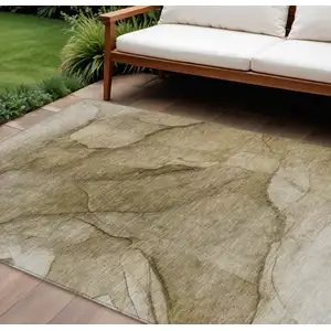 Photo of Brown Beige And Taupe Abstract Washable Indoor Outdoor Area Rug