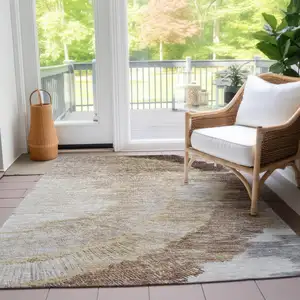 Photo of Brown Beige And Taupe Abstract Washable Indoor Outdoor Area Rug