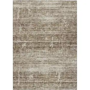 Photo of Brown Beige And Taupe Abstract Washable Indoor Outdoor Area Rug