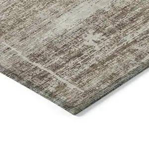 Photo of Brown Beige And Taupe Abstract Washable Indoor Outdoor Area Rug