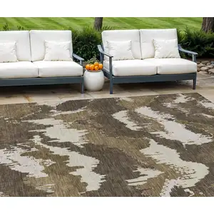 Photo of Brown Beige And Taupe Abstract Washable Indoor Outdoor Area Rug