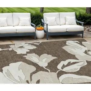 Photo of Brown Beige And Taupe Floral Washable Indoor Outdoor Area Rug