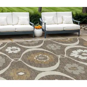 Photo of Brown Beige And Taupe Medallion Washable Indoor Outdoor Area Rug