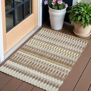 Photo of Brown Beige And Taupe Southwestern Washable Indoor Outdoor Area Rug