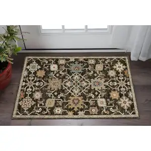 Photo of Brown Black And Tan Oriental Area Rug