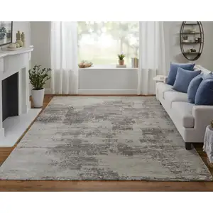 Photo of Brown Black and Tan Abstract Hand Tufted Area Rug