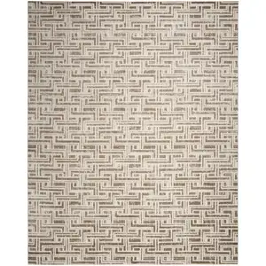 Photo of Brown Geometric Distressed Area Rug