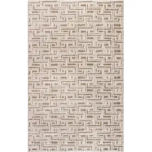 Photo of Brown Geometric Distressed Area Rug