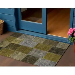 Photo of Brown Gold And Taupe Patchwork Washable Indoor Outdoor Area Rug