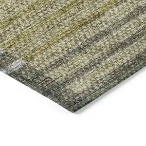 Photo of Brown Gold And Taupe Striped Washable Indoor Outdoor Area Rug