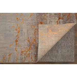 Photo of Brown Gold and Gray Abstract Power Loom Area Rug