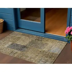 Photo of Brown Gray And Charcoal Patchwork Washable Indoor Outdoor Area Rug