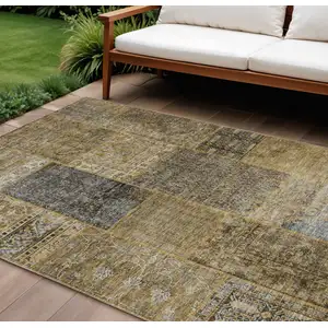 Photo of Brown Gray And Charcoal Patchwork Washable Indoor Outdoor Area Rug