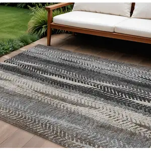 Photo of Brown Gray And Ivory Botanical Leaves Washable Indoor Outdoor Area Rug