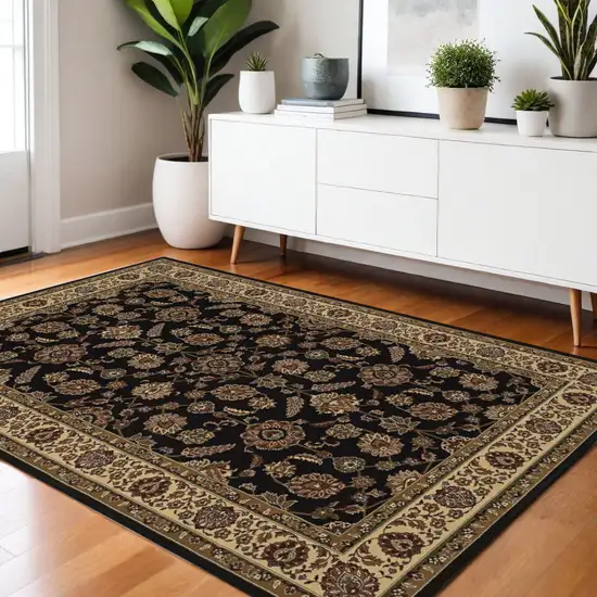 Brown Ivory And Black Oriental Area Rug Photo 1