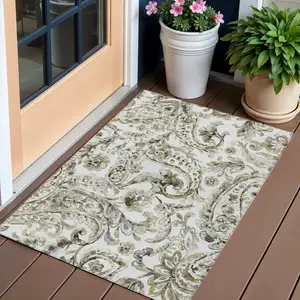 Photo of Brown Ivory And Tan Paisley Washable Indoor Outdoor Area Rug