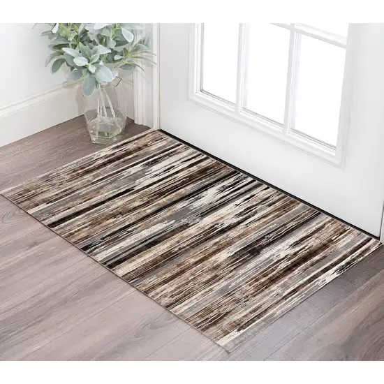 Brown Ivory and Tan Abstract Washable Non Skid Area Rug Photo 1