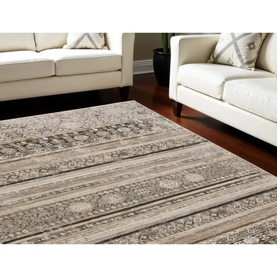 Brown Oriental Area Rug With Fringe Photo 1