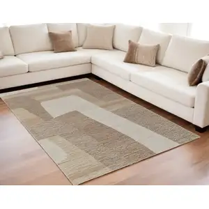 Photo of Brown Tan and Ivory Wool Abstract Hand Tufted Area Rug