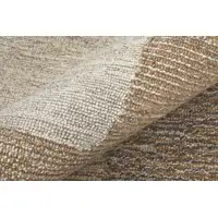 Photo of Brown Tan and Ivory Wool Abstract Hand Tufted Area Rug