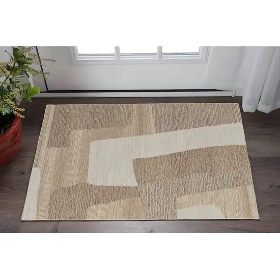 Brown Tan and Ivory Wool Abstract Hand Tufted Area Rug Photo 1