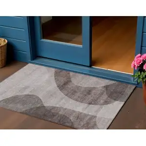 Photo of Brown Taupe And Beige Abstract Washable Indoor Outdoor Area Rug