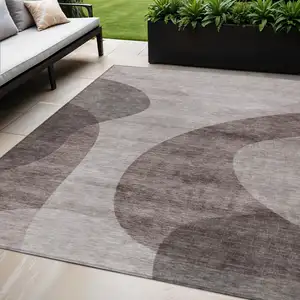 Photo of Brown Taupe And Beige Abstract Washable Indoor Outdoor Area Rug