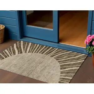 Photo of Brown Taupe And Beige Abstract Washable Indoor Outdoor Area Rug