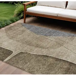 Photo of Brown Taupe And Beige Abstract Washable Indoor Outdoor Area Rug