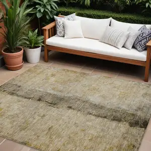 Photo of Brown Taupe And Gold Abstract Washable Indoor Outdoor Area Rug