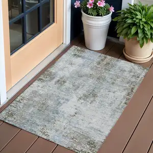 Photo of Brown Taupe And Gray Abstract Washable Indoor Outdoor Area Rug