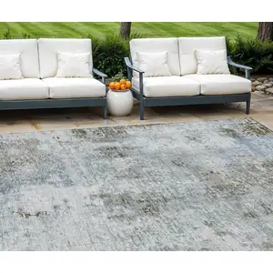 Photo of Brown Taupe And Gray Abstract Washable Indoor Outdoor Area Rug