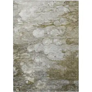 Photo of Brown Taupe And Ivory Abstract Washable Indoor Outdoor Area Rug