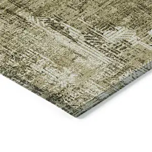 Photo of Brown Taupe And Ivory Abstract Washable Indoor Outdoor Area Rug