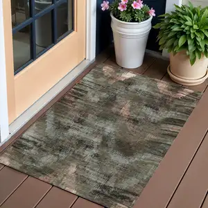 Photo of Brown Taupe And Salmon Abstract Washable Indoor Outdoor Area Rug