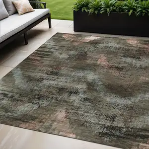 Photo of Brown Taupe And Salmon Abstract Washable Indoor Outdoor Area Rug