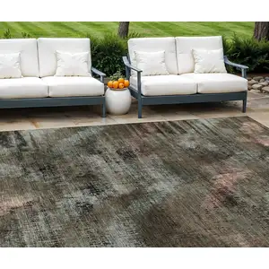 Photo of Brown Taupe And Salmon Abstract Washable Indoor Outdoor Area Rug