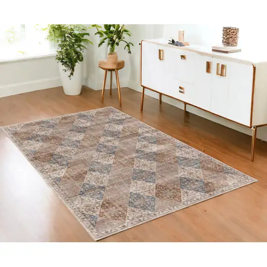 Brown and Blue Floral Distressed Area Rug Photo 1