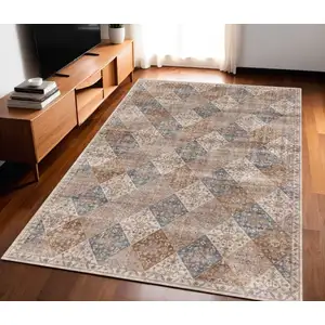 Photo of Brown and Blue Floral Distressed Area Rug