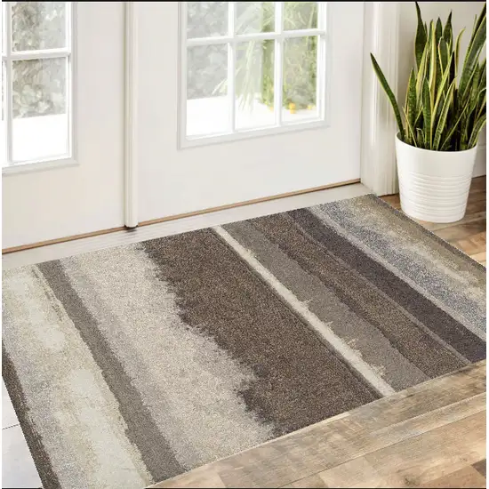 Brown and Ivory Abstract Area Rug Photo 1