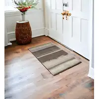 Photo of Brown and Ivory Abstract Area Rug