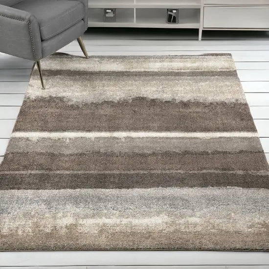 Brown and Ivory Abstract Area Rug Photo 1