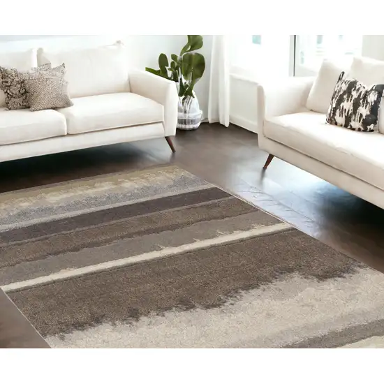 Brown and Ivory Abstract Area Rug Photo 1